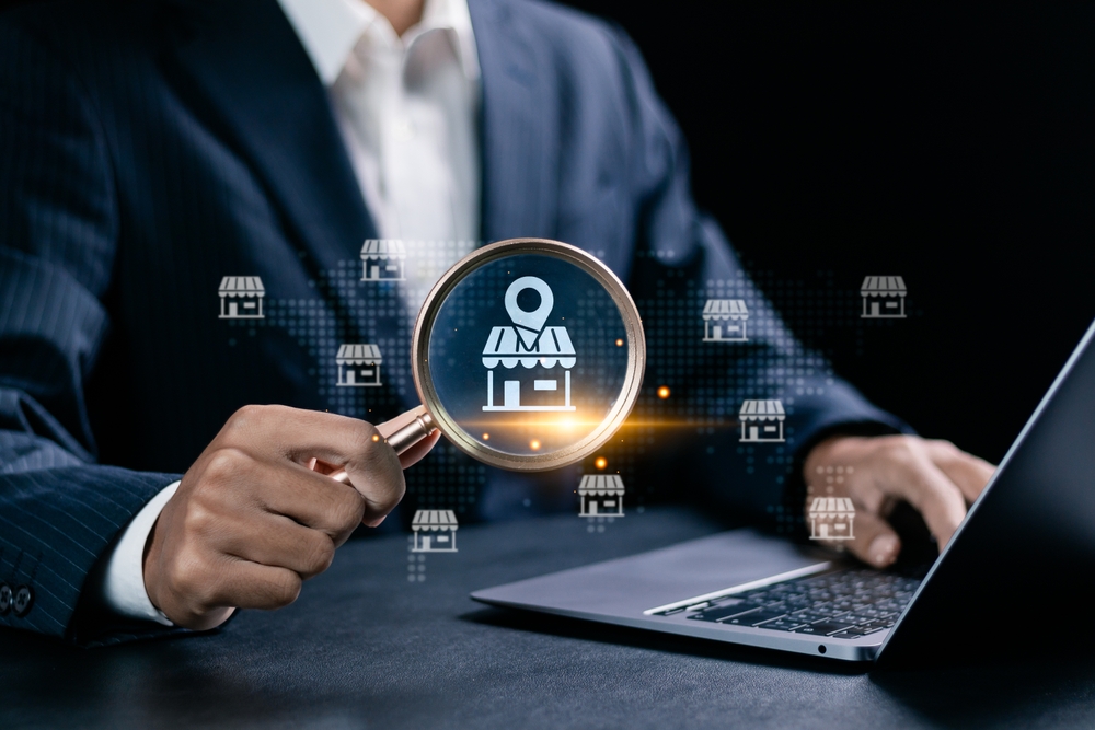 Local marketplace e-commerce concept, local seo strategy, local search optimization, small business and retail. Businessman use laptop with local marketplace icons on virtual screen.